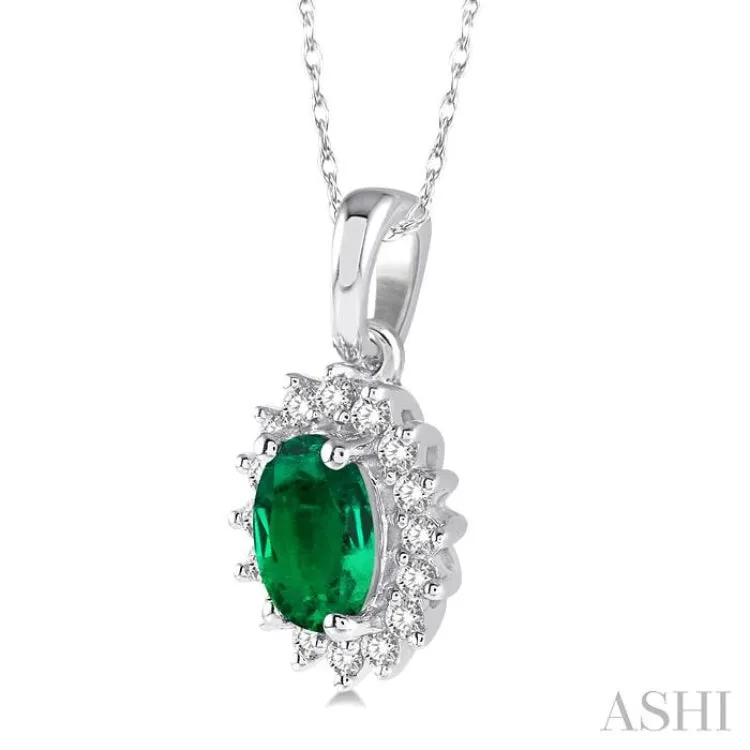 1/8 Ctw Round Cut Diamond and Oval Cut 6x4 MM Emerald Center Sunflower Precious Pendant in 10K White Gold with chain