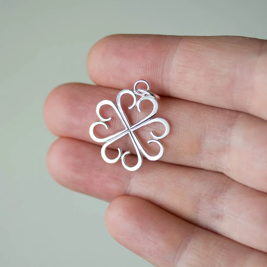 Good Luck Pendant, Small Four Leaf Clover Made of Silver Hearts