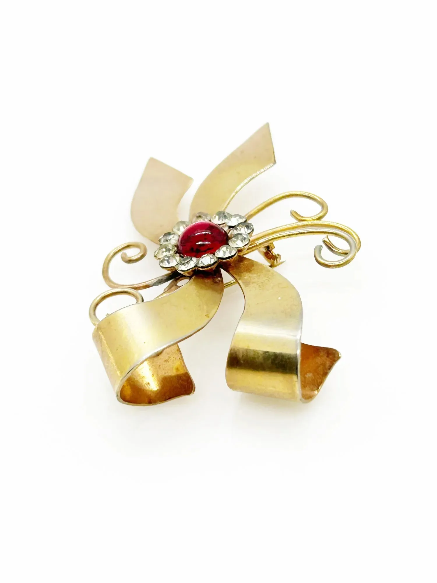 Vintage Abstract Bow Brooch with Red Cabochon and Bright Rhinestones