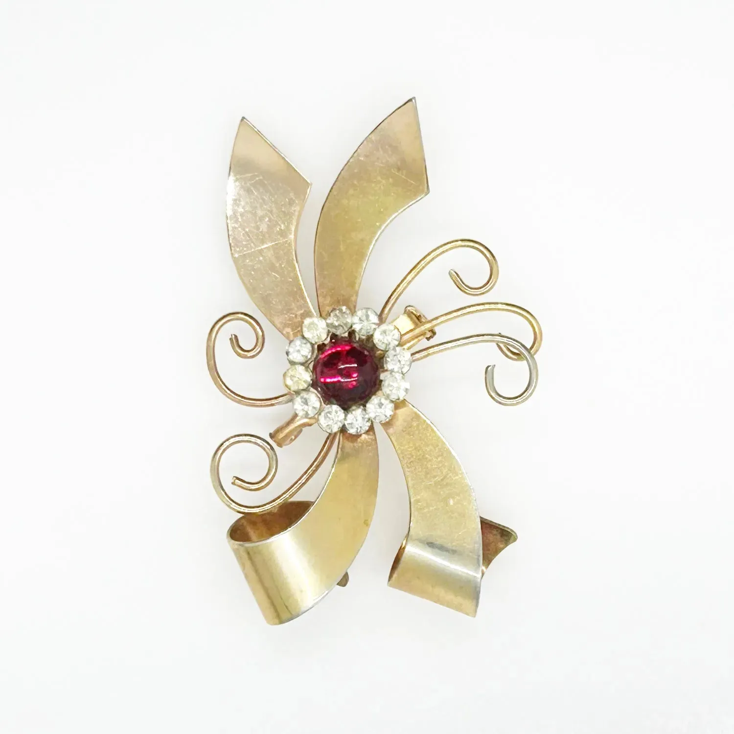 Vintage Abstract Bow Brooch with Red Cabochon and Bright Rhinestones