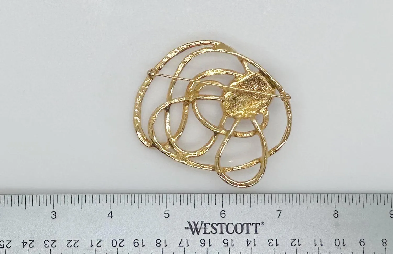 Vintage Avon "Golden Web” Brooch with Purple Cabochon Center (1992)